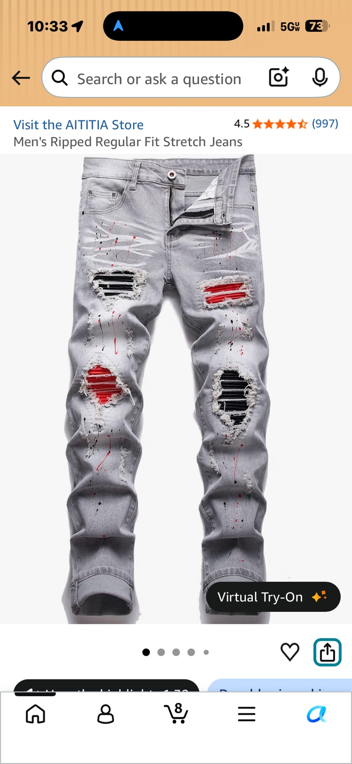Gray AITITIA ripped jeans with red and black patches and paint-splatter details