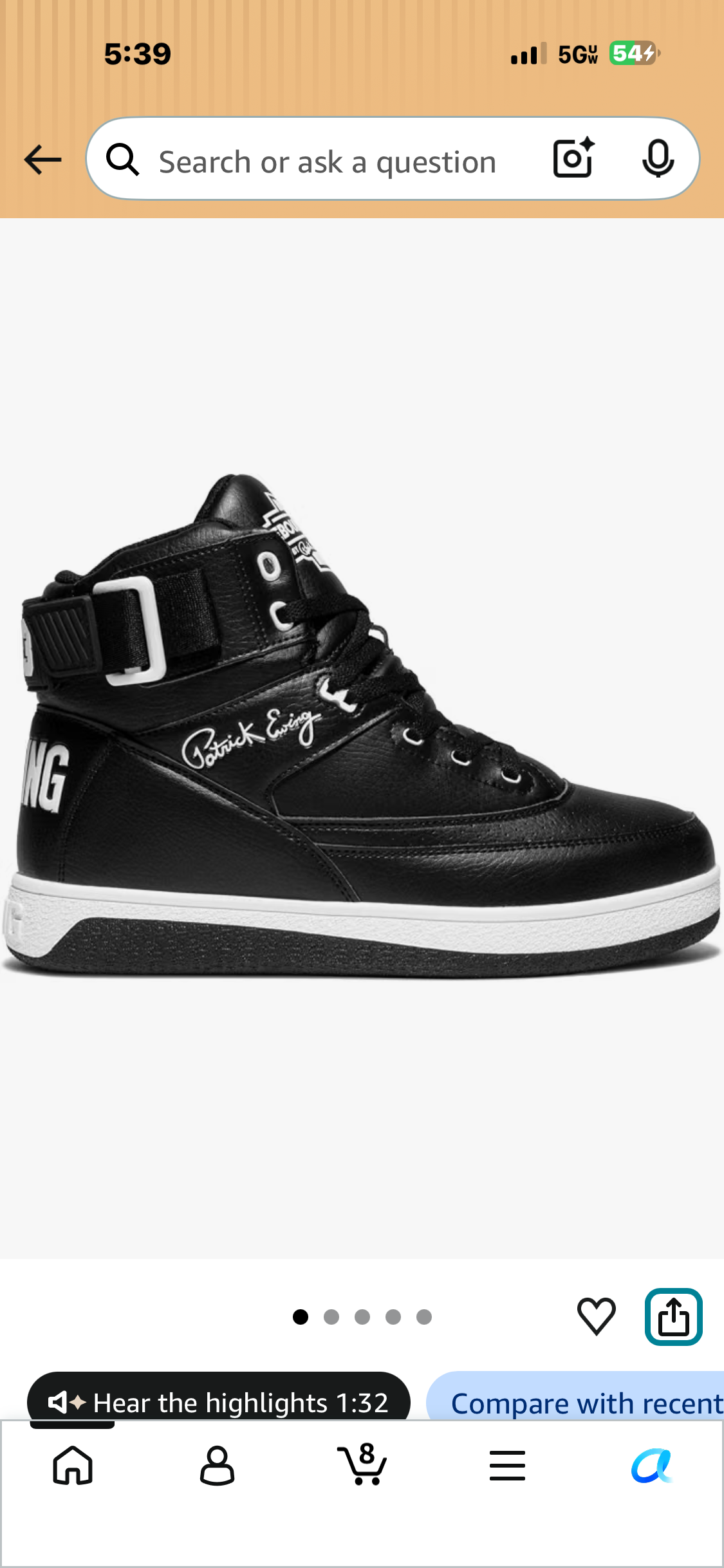 Black Ewing high-top sneakers with white accents, ankle strap and Patrick Ewing signature