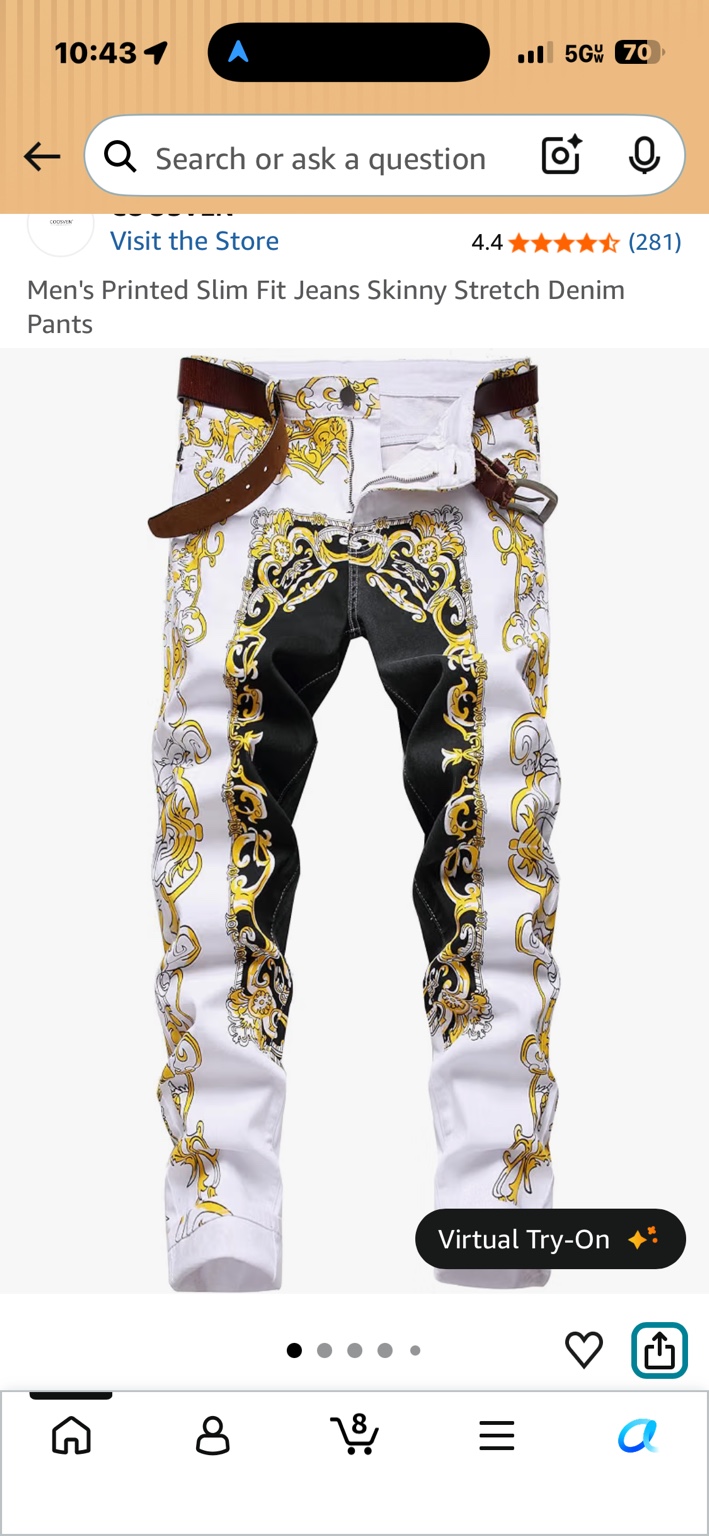 White and black slim-fit jeans with ornate gold scroll print