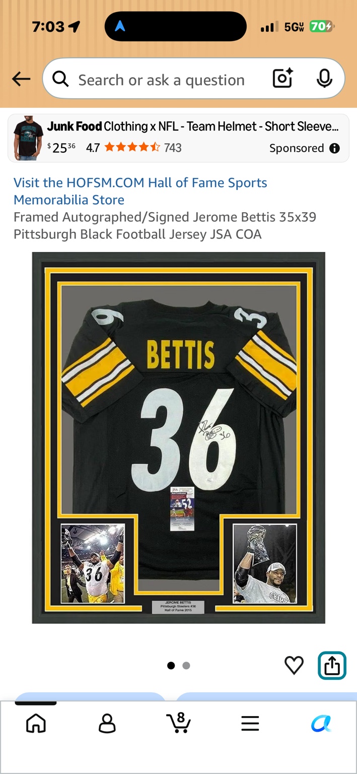 Framed black and gold Jerome Bettis number 36 Pittsburgh jersey display with signature and two photographs