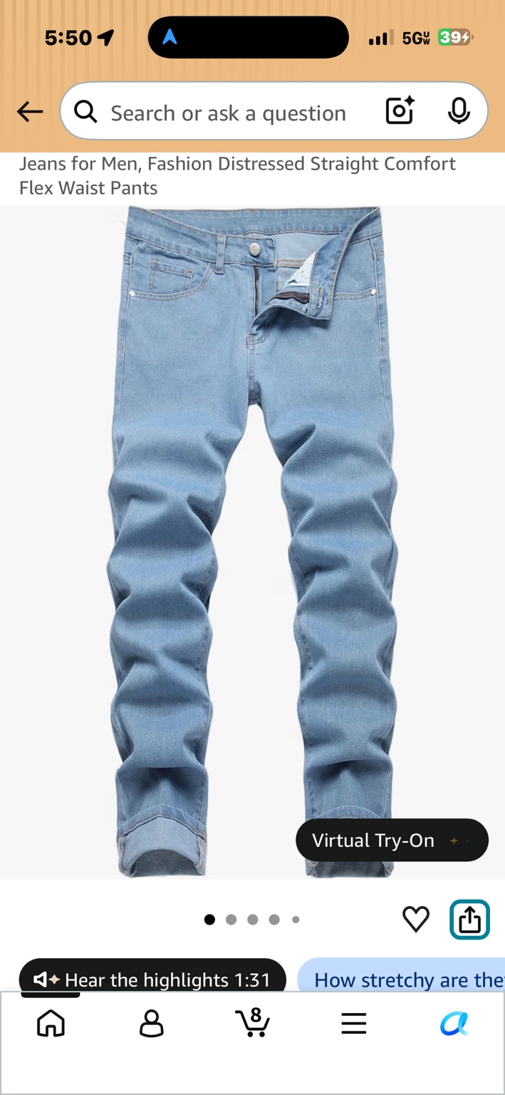 Men's light-blue jeans with a plain denim finish and turned-up cuffs