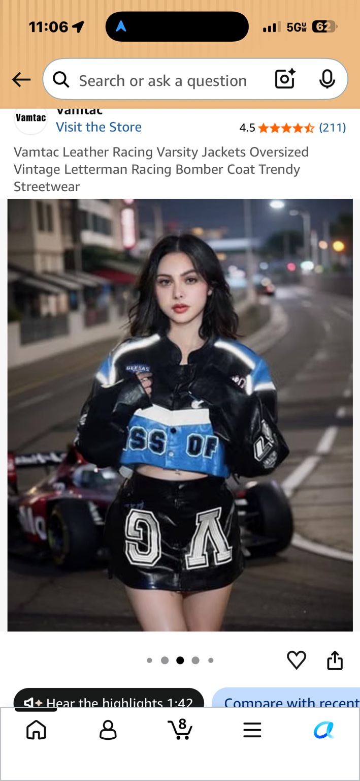 Model wearing a black, blue and white Vamtac racing jacket